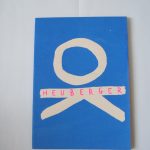 Colour, white, bright blue and neon pink "Heuberger" zine cover. Text only, however the OK word turned on its side looks like a stick figure .